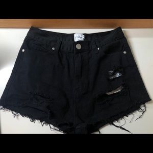 Princess Polly ripped black jean shorts!